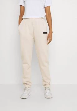 Nly By Nelly EMPOWERED PANTS - Jogginghose - Creme, Damen